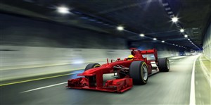 隧道內奔馳的紅色賽車高清攝影
