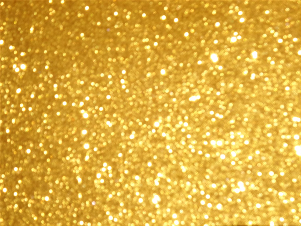 金色发光粒子背景高清图片
