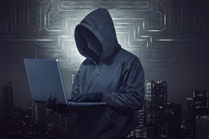 灰色科技线条城市背景上操作电脑的黑客高清图片