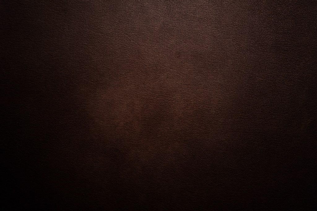 黑棕色牛皮纹理背景高清图片