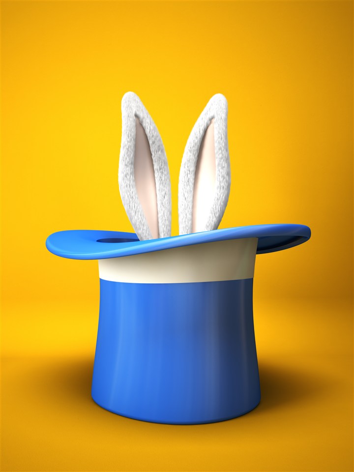 蓝色魔术帽里的兔子耳朵高清图