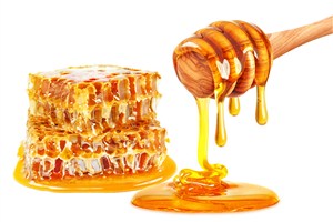蜂蜜棒上滴落的蜂蜜和蜂巢高清