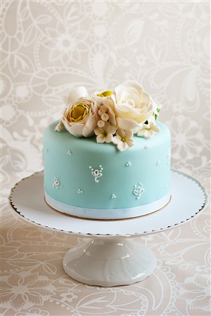 唯美背景大花朵蓝色蛋糕图片